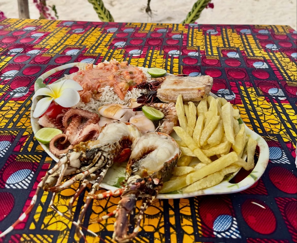 Seafood lunch served on a full-day Watamu boat trip