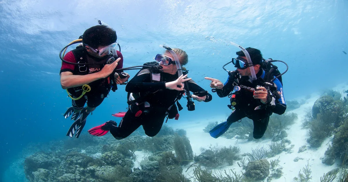 Beginner diver with instructor during a Discover Scuba Diving experience