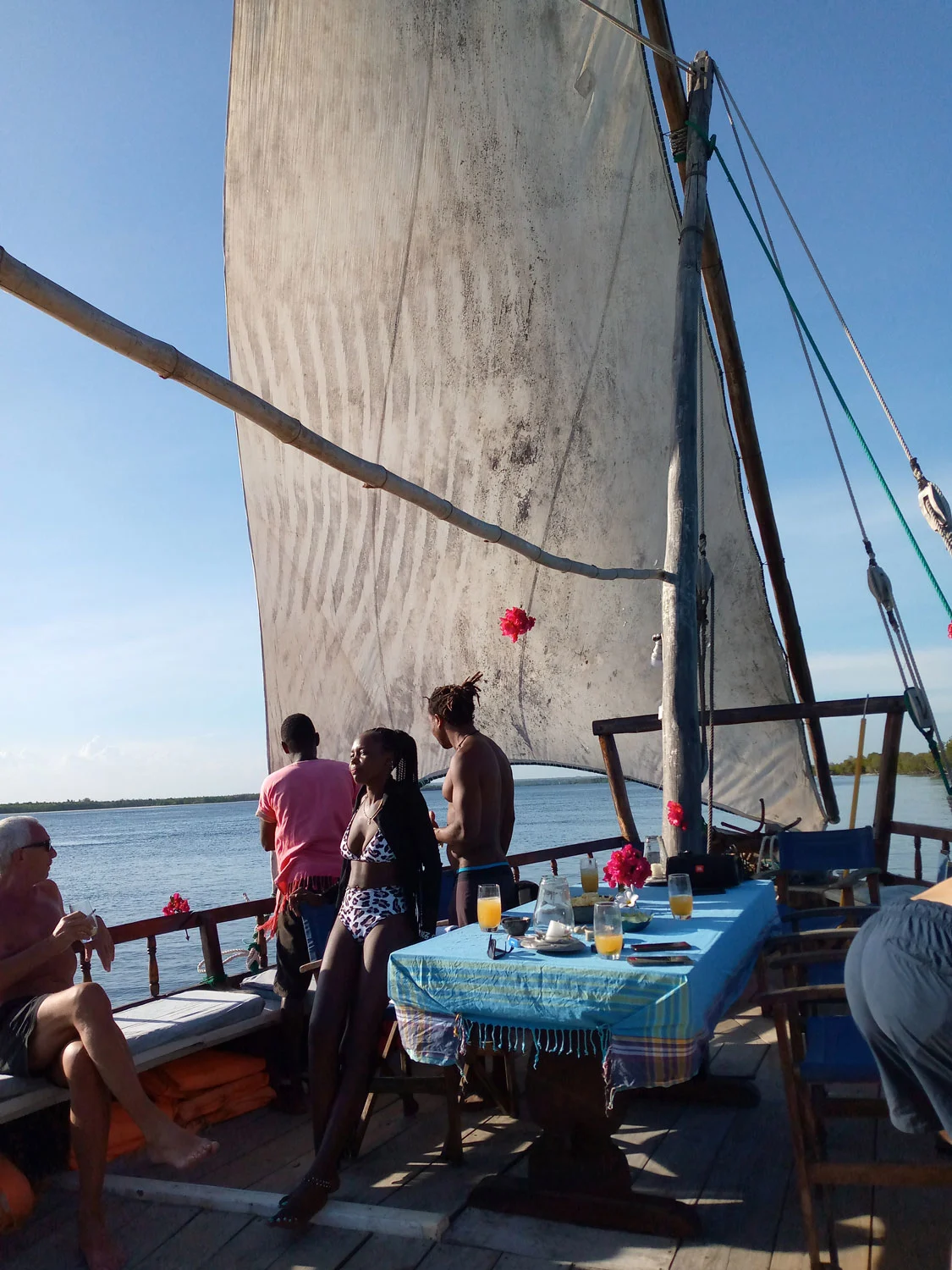 Dhow captain briefing guests at the Mida Creek dock before departure
