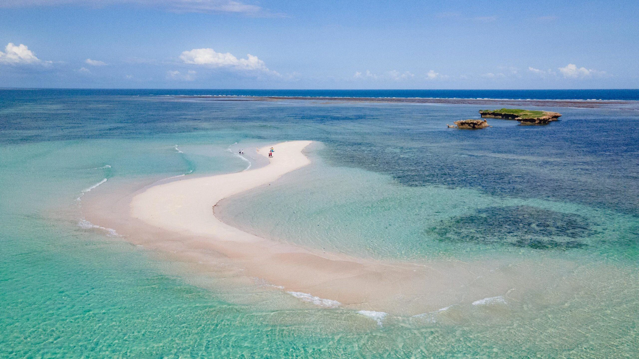 Exposed reef and shallow turquoise water at low tide in Watamu on the Kenyan coast