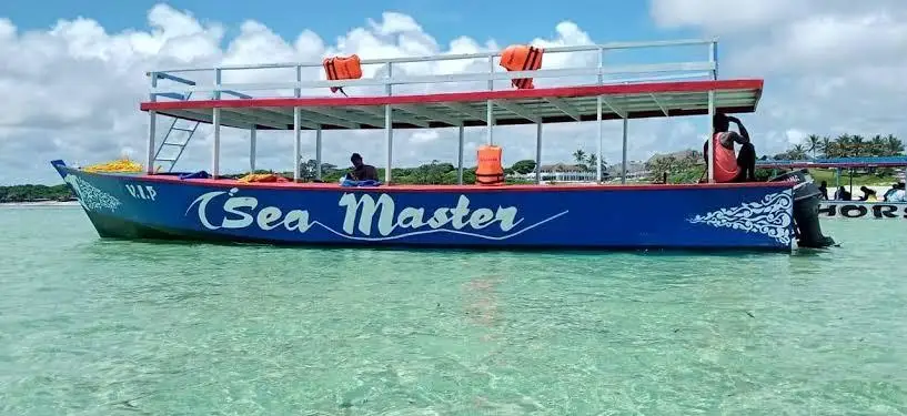 Morning glass-bottom boat excursion in Watamu Marine National Park, Kenya