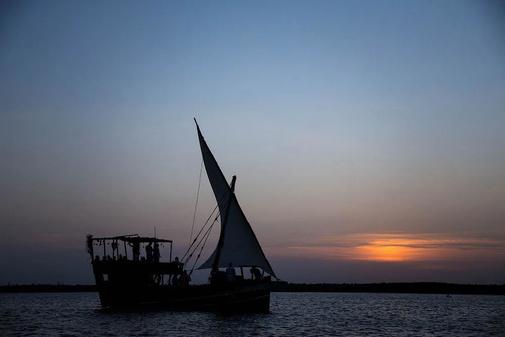 Dhow departing into the Mida Creek mangroves during the late afternoon